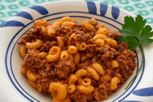 asy one-pot Italian pasta dinner with sausage, shells, and herbs